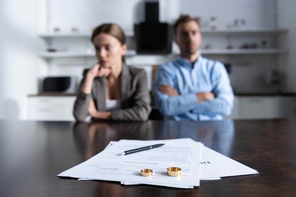 Melbourne couple dealing with divorce and property settlement documents.